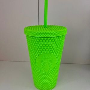 Bright green Starbucks cup